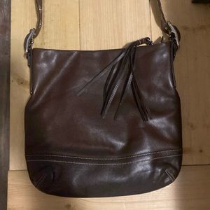 Brown leather Coach purse.